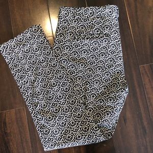 Black and cream patterned crops